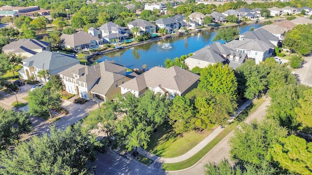 bird's eye view featuring a residential view and a water view