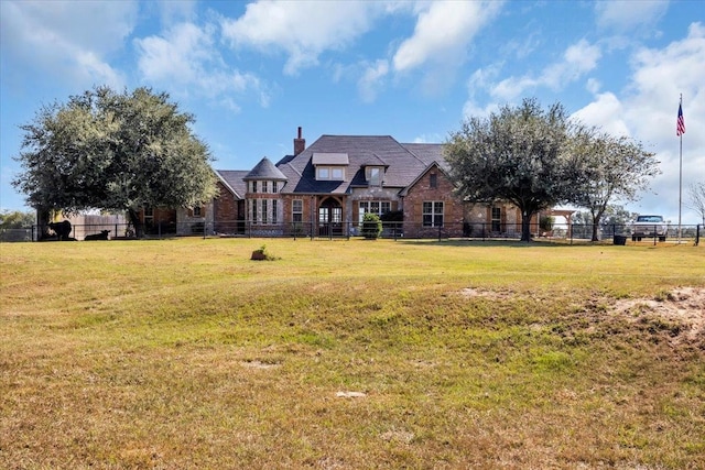 view of front of home with a front yard