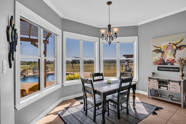 tiled dining room featuring crown molding, a notable chandelier, and plenty of natural light