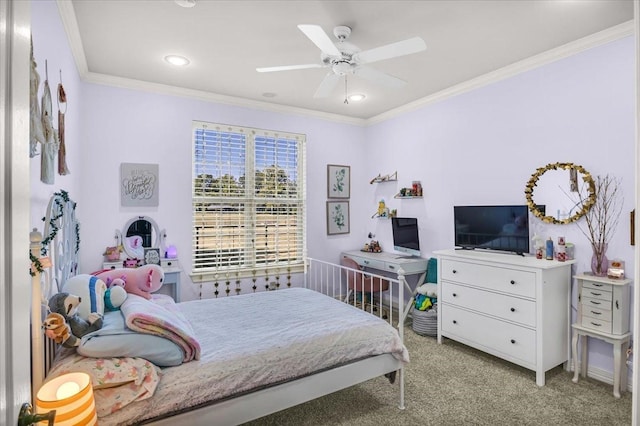 carpeted bedroom with ceiling fan and ornamental molding