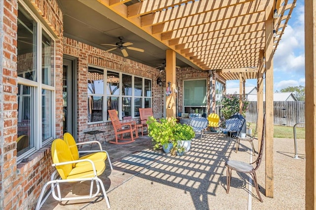 view of patio featuring a pergola and ceiling fan