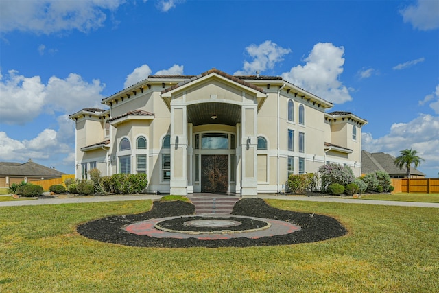 view of front of property featuring a front yard