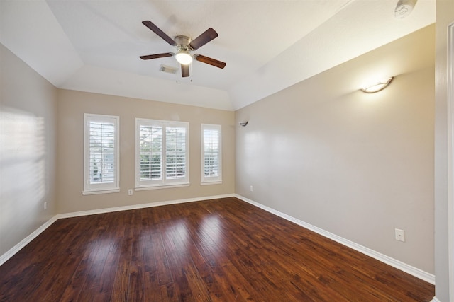 spare room featuring ceiling fan and dark hardwood / wood-style flooring