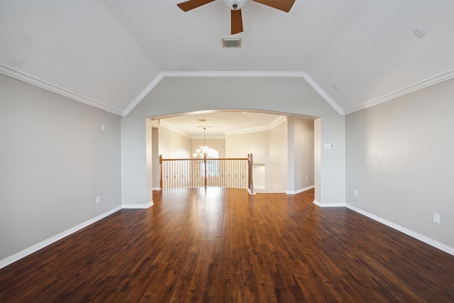 unfurnished living room featuring crown molding, lofted ceiling, dark hardwood / wood-style flooring, and ceiling fan with notable chandelier