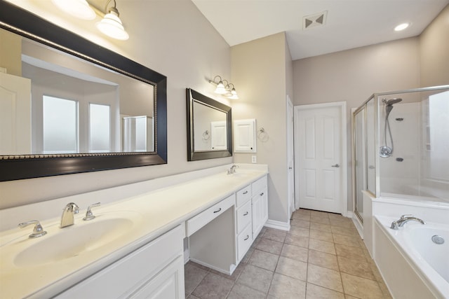 bathroom with vanity, independent shower and bath, and tile patterned floors