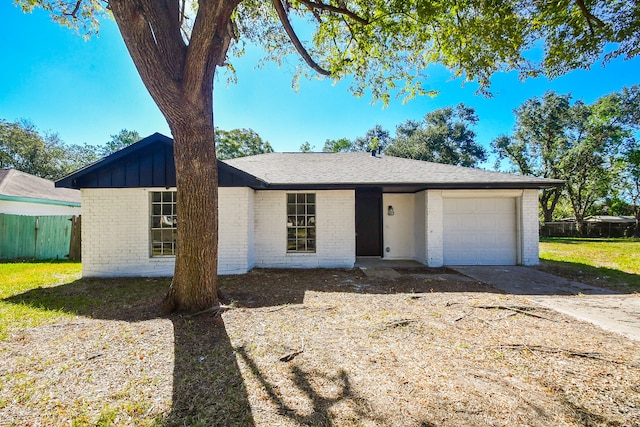 single story home with a garage