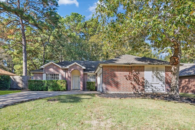 ranch-style house with a front lawn