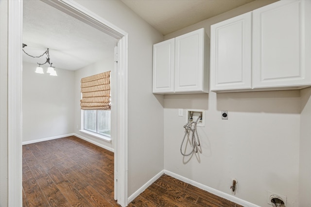 washroom with cabinets, dark hardwood / wood-style flooring, electric dryer hookup, and hookup for a washing machine