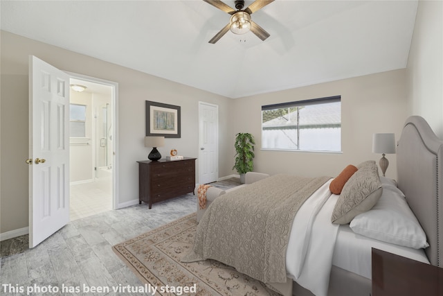 bedroom with light hardwood / wood-style floors, ceiling fan, and vaulted ceiling