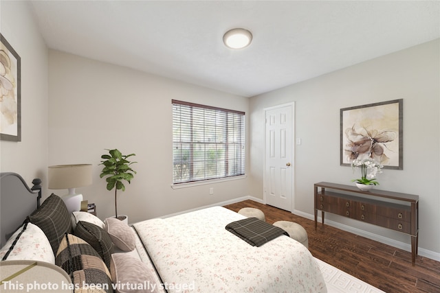 bedroom with dark wood-type flooring