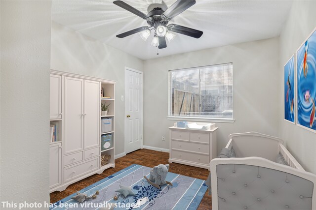 bedroom featuring dark wood-type flooring and ceiling fan