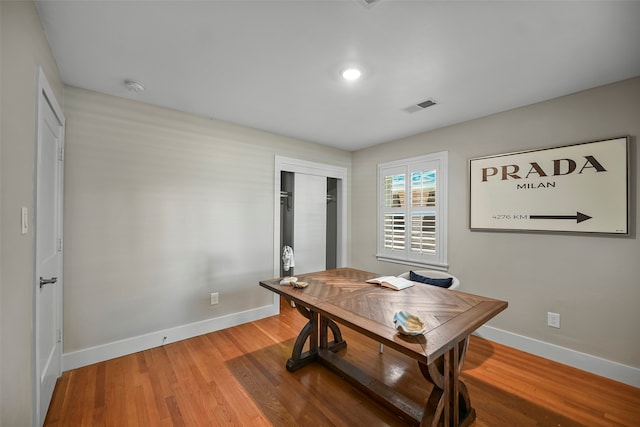 office with wood-type flooring