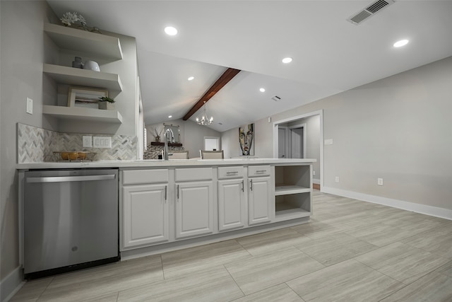 kitchen featuring white cabinets, stainless steel dishwasher, a chandelier, lofted ceiling with beams, and sink