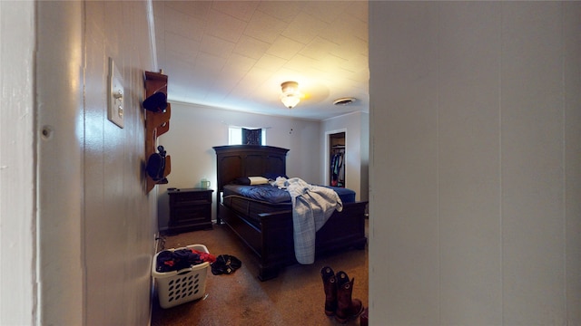 bedroom featuring dark colored carpet