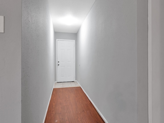 hallway featuring light hardwood / wood-style flooring