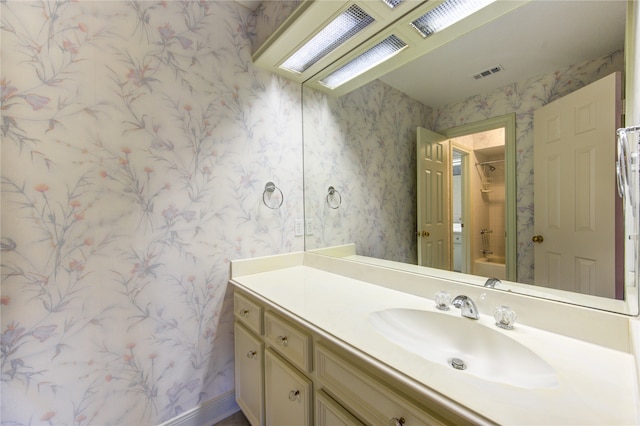 bathroom featuring vanity and shower / bathing tub combination