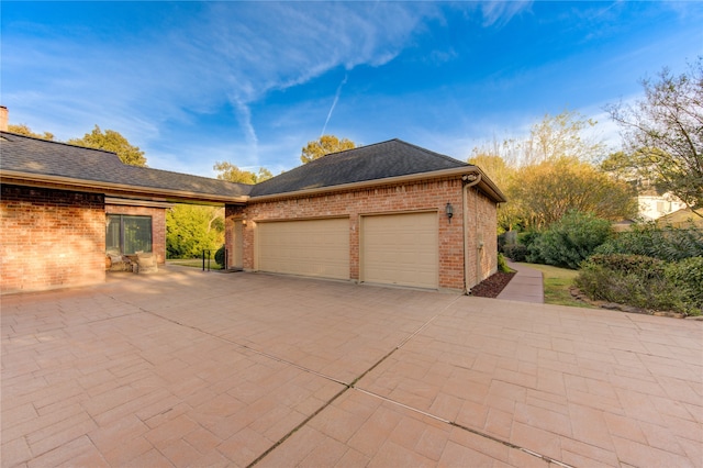 view of home's exterior with a garage