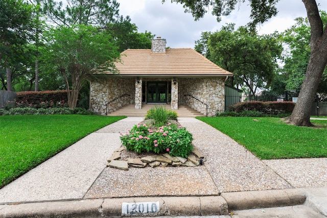 view of front of home with a front yard