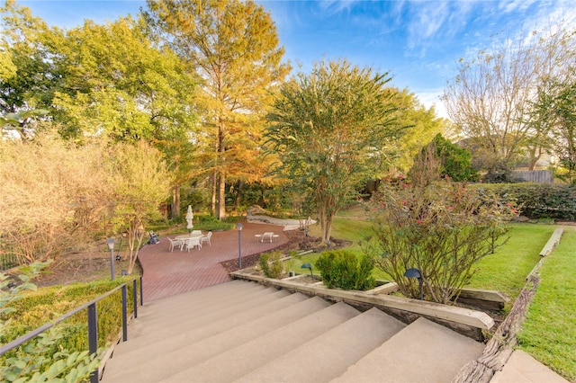 surrounding community with a patio area