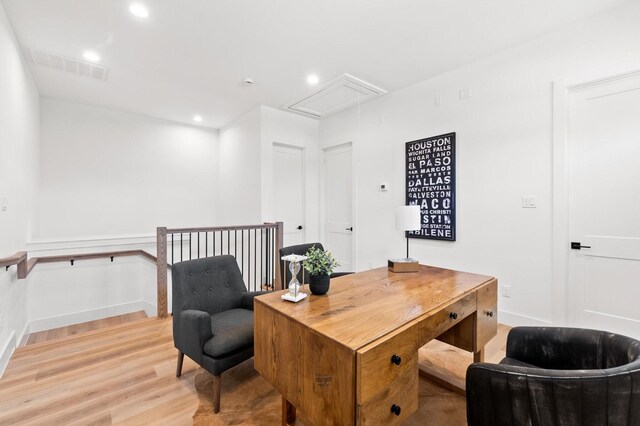 office with recessed lighting, wood finished floors, visible vents, baseboards, and attic access