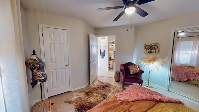 bedroom with ceiling fan and light tile patterned flooring