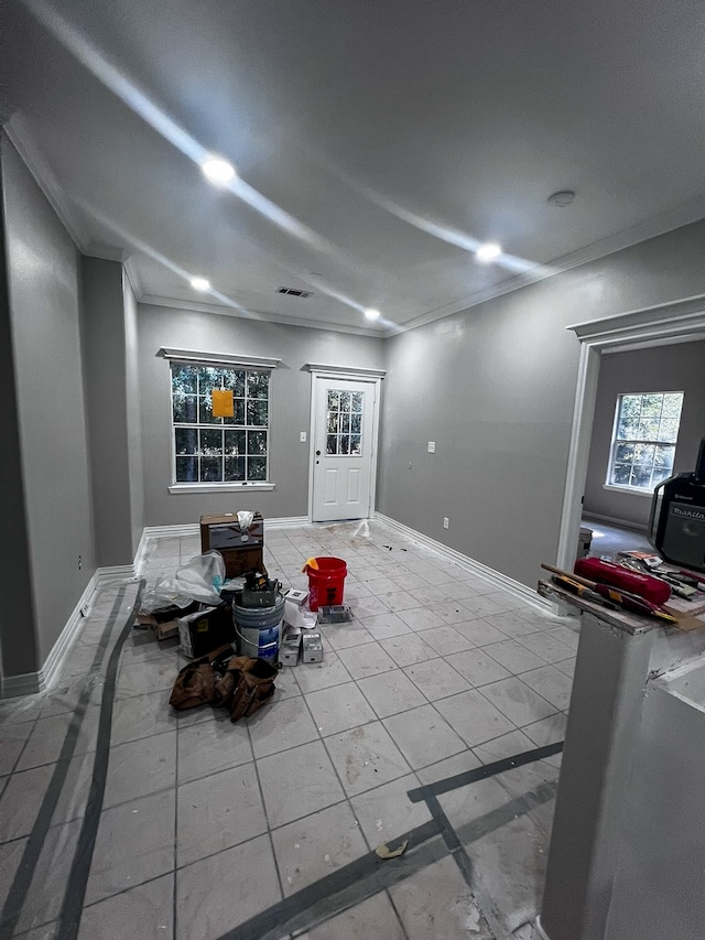 interior space featuring ornamental molding