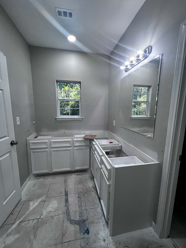 bathroom featuring plenty of natural light