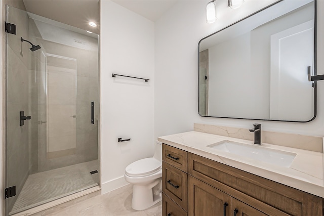 bathroom with a shower with door, vanity, and toilet