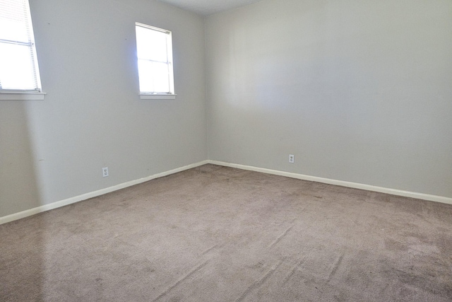 6823 County Road 659, Brazoria, TX 77422 - carpeted empty room with baseboards