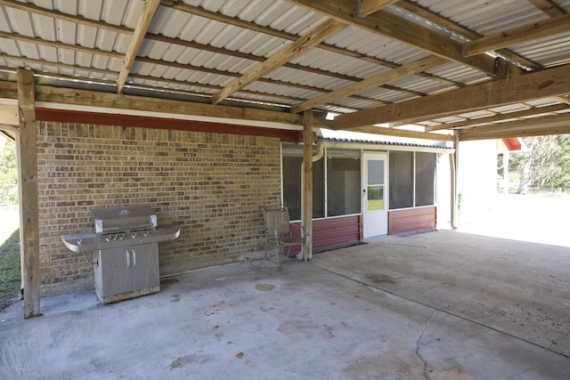 6823 County Road 659, Brazoria, TX 77422 - view of patio with area for grilling and a sunroom