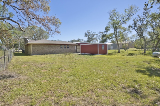 6823 County Road 659, Brazoria, TX 77422 - view of yard with an outdoor structure