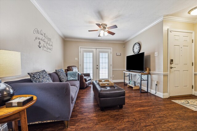 living room with french doors, crown molding, dark hardwood / wood-style floors, and ceiling fan