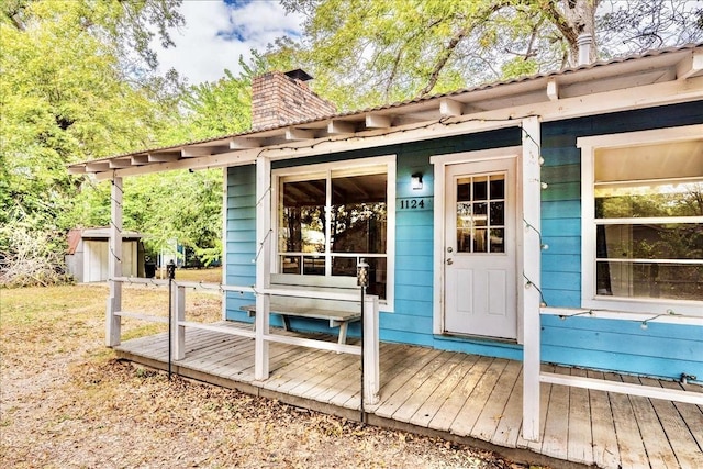 exterior space featuring a wooden deck