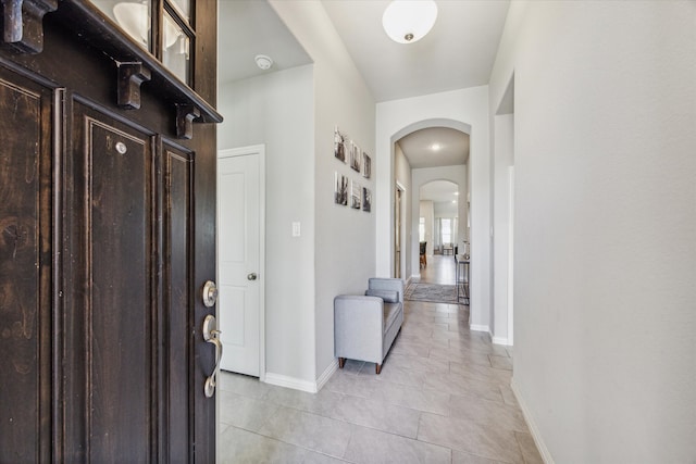 entrance foyer featuring light tile patterned floors