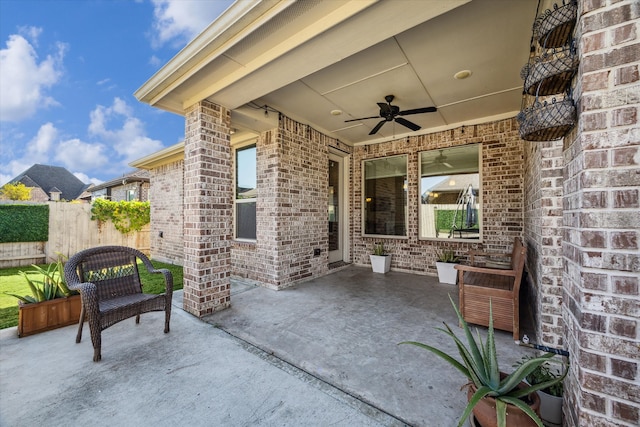 view of patio with ceiling fan