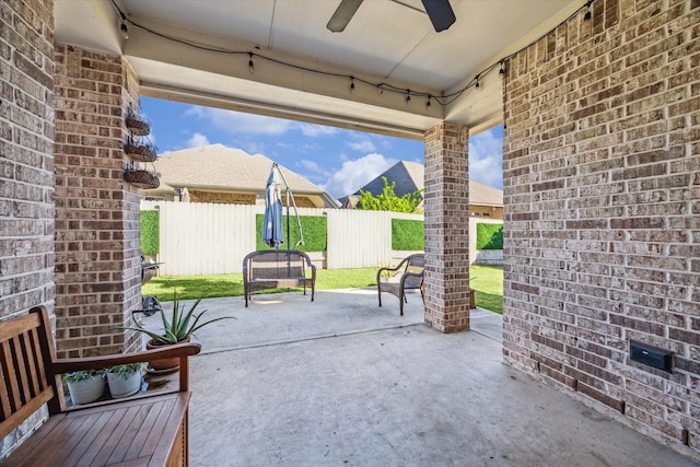 view of patio with ceiling fan