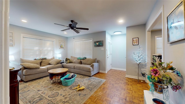 living room with parquet flooring and ceiling fan