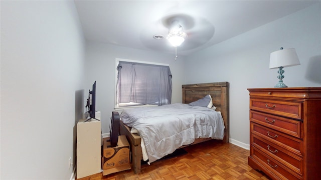 bedroom featuring light parquet floors and ceiling fan