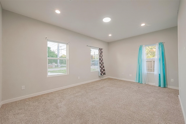 spare room featuring carpet flooring