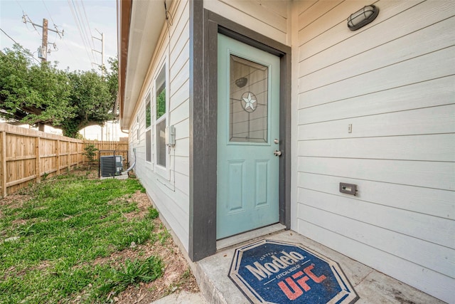 property entrance with central AC unit