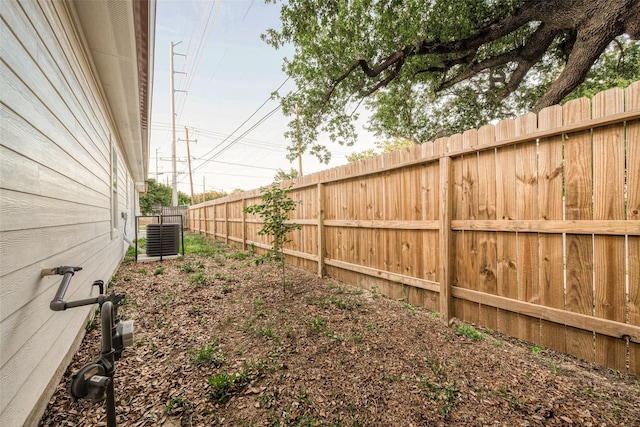 view of yard featuring central AC unit