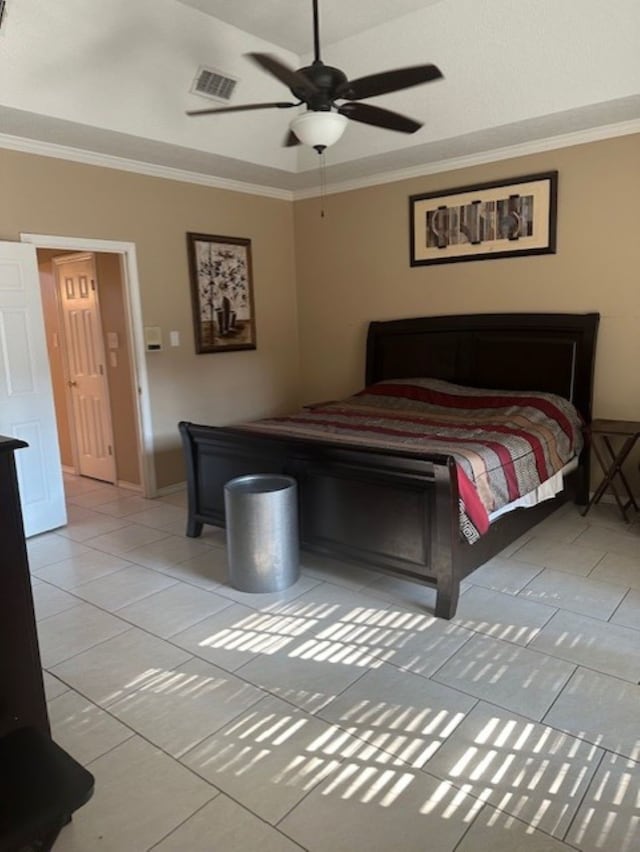 bedroom featuring light tile patterned floors and crown molding