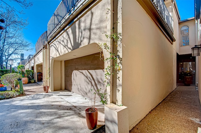 view of side of home with a balcony