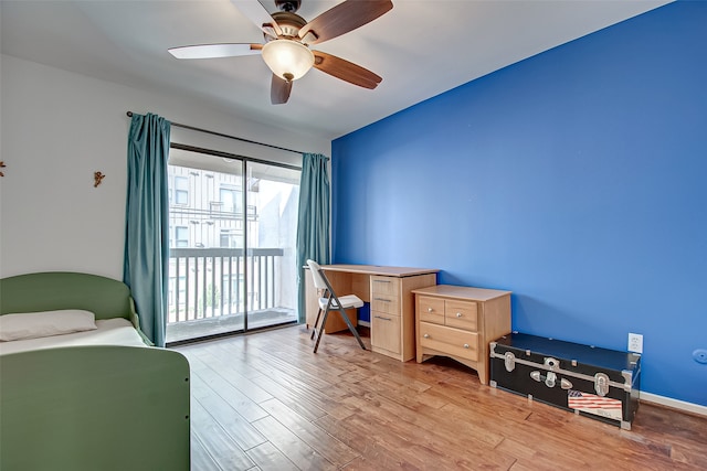 bedroom with access to exterior, light wood-type flooring, and ceiling fan