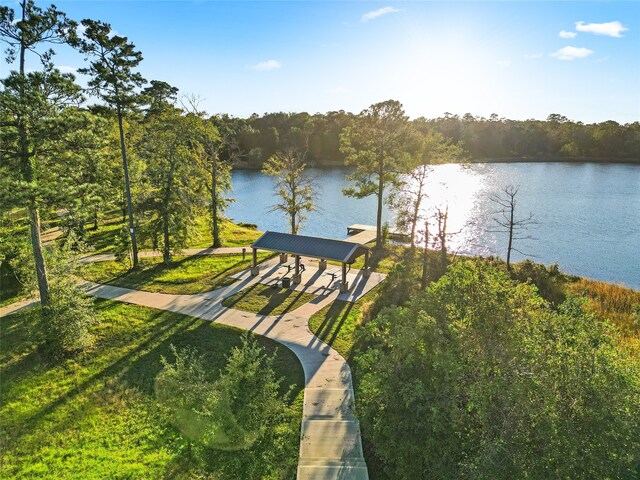 exterior space with a gazebo and a water view