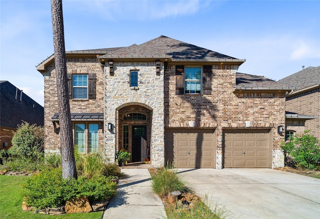 view of front of home with a garage