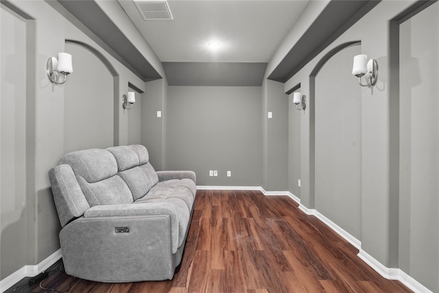 living area with dark wood-type flooring