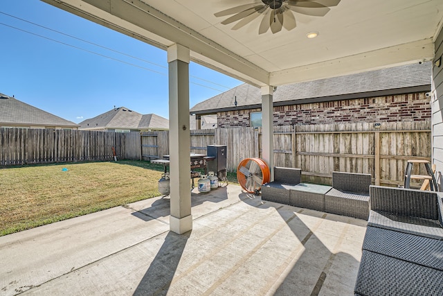 view of patio featuring an outdoor living space and ceiling fan