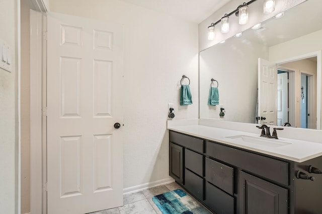 bathroom with vanity and tile patterned flooring