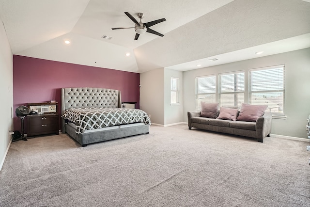 bedroom with carpet, vaulted ceiling, and ceiling fan